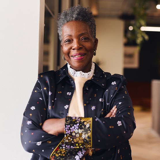 Senior woman smiling in office