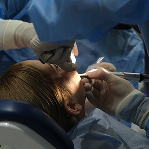Woman getting oral surgery